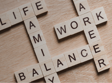 Work life balance text displayed with wooden blocks