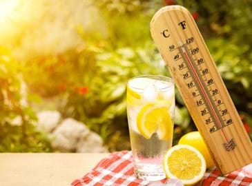 Iced drink next to a thermometer