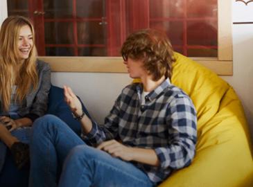 Two young people talking