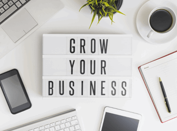 Grow you business sign on a desk