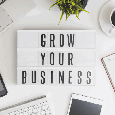 Grow you business sign on a desk
