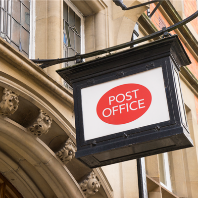Post Office sign on a building