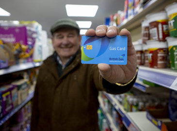 A customer holding a British Gas Card