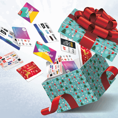Gift cards and gift cards flying out of present box