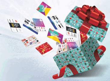 Gift cards and gift cards flying out of present box