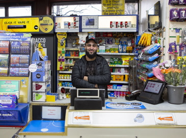 Shop worker at kiosk