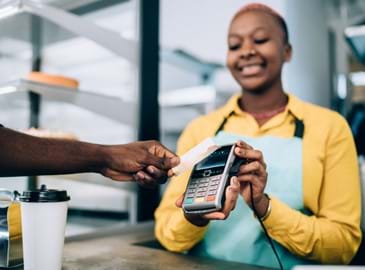 Cashier receiving card payment 