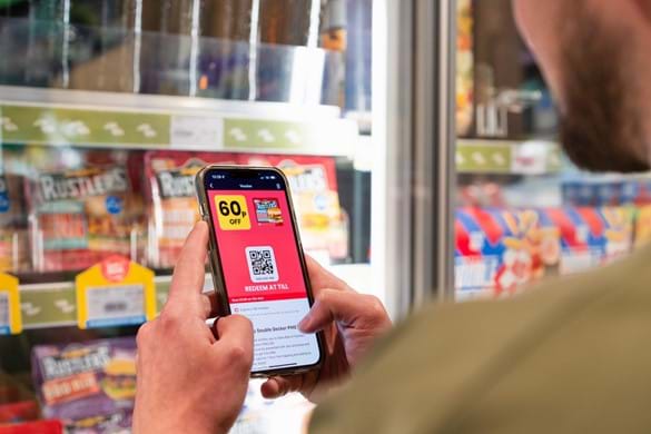 A retail customer using Jisp app on a smart phone