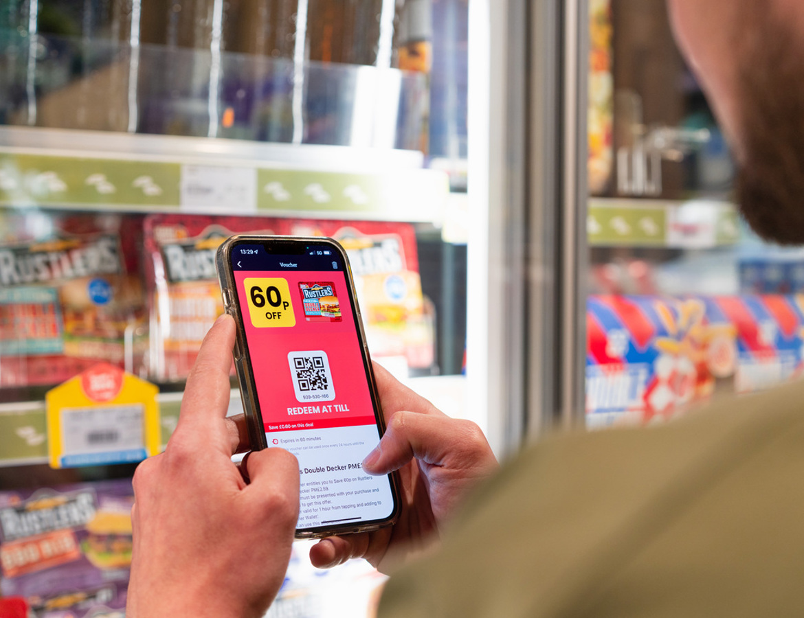 A retail customer using Jisp app on a smart phone